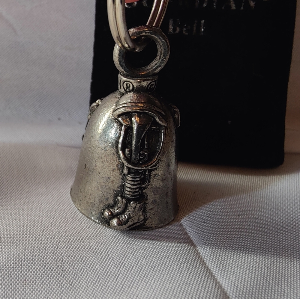 This is a Guardian Bell with the inscription "In memory of our fallen heroes". 
